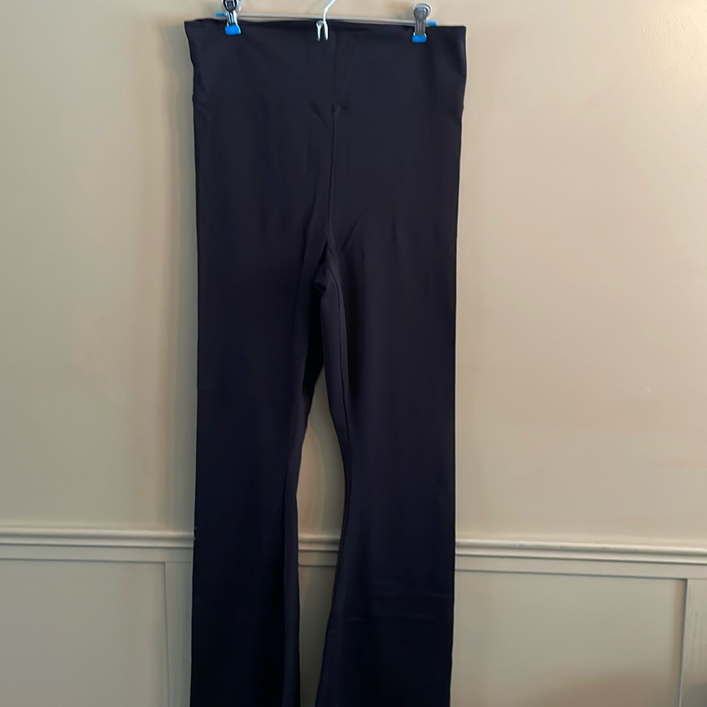 Black fold over waist bootcut pants. Size XS